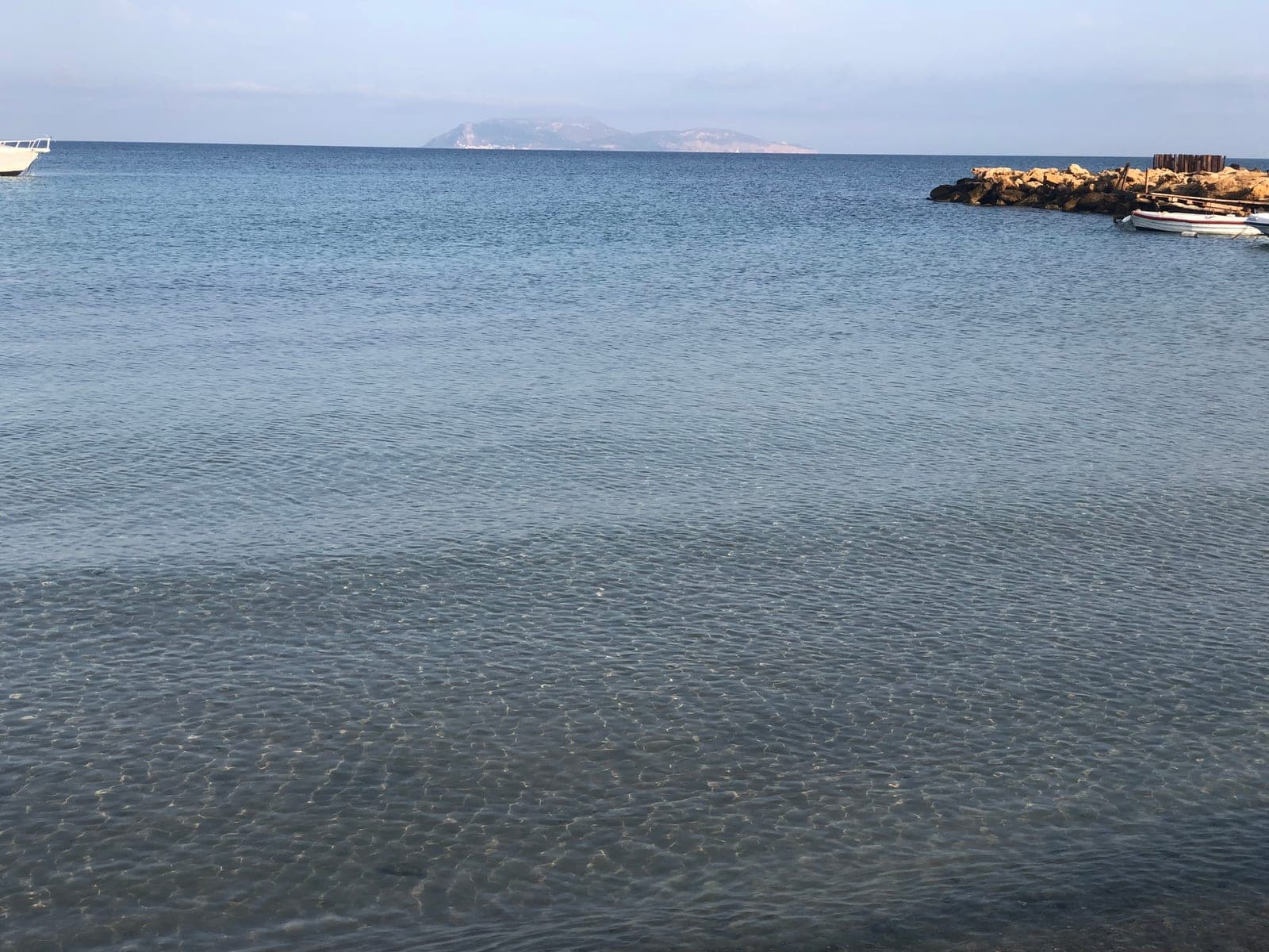 Boats on clear Sicilian water for the island excursion