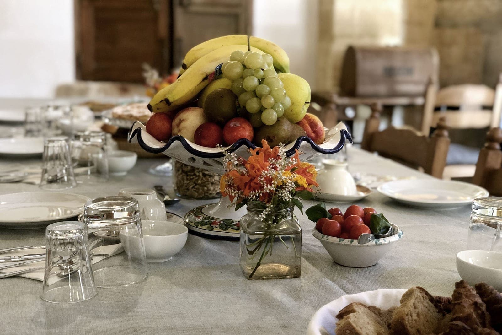 A breakfast table set with fruit for farewell morning